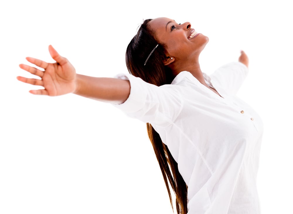 Happy woman enjoying her freedom - isolated over white background